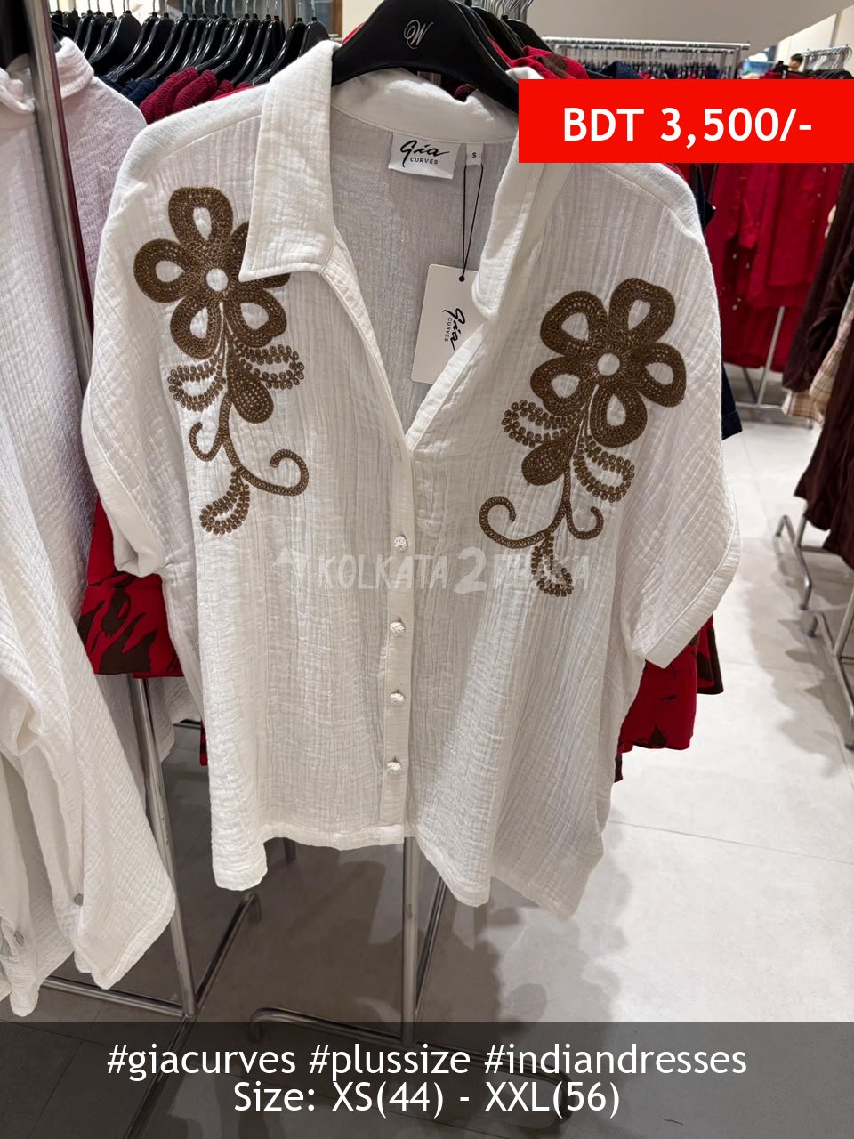 Gia Curves beige shirt