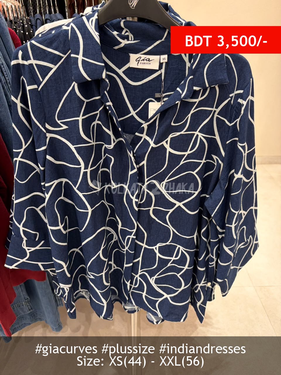 Gia Curves navy shirt
